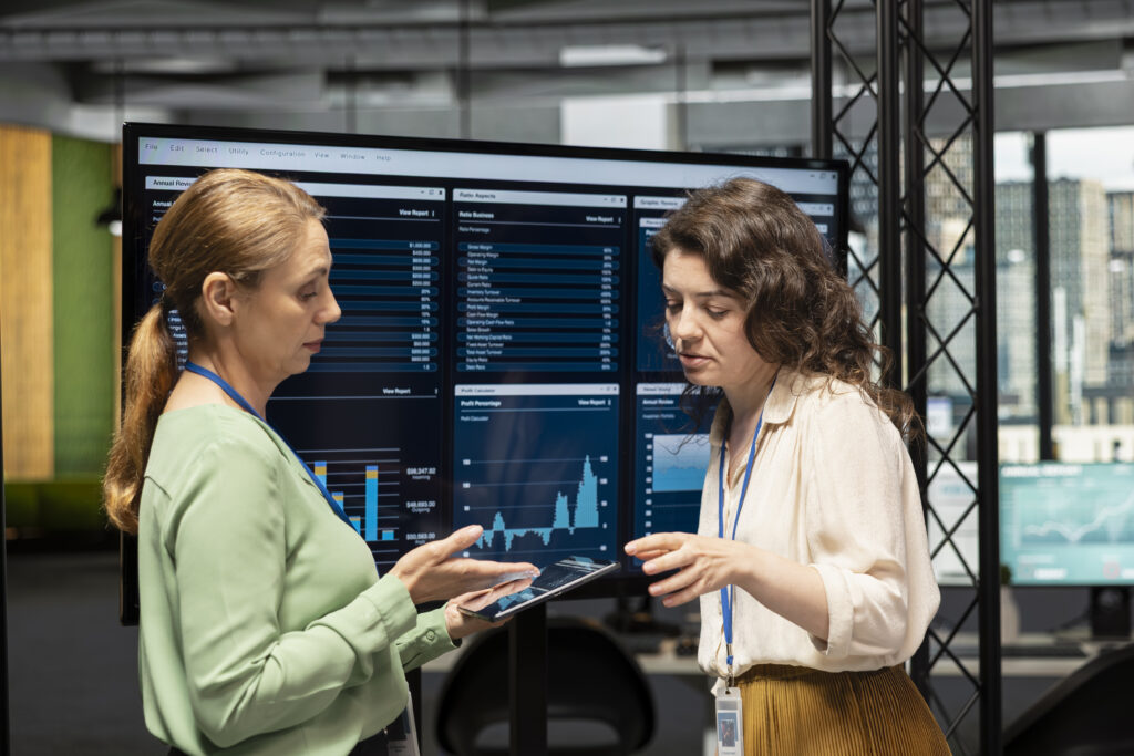 Goals Oriented Businesswomen Dive Deep Into Financial Reports Leveraging Graphs Indicators 1 1024x683