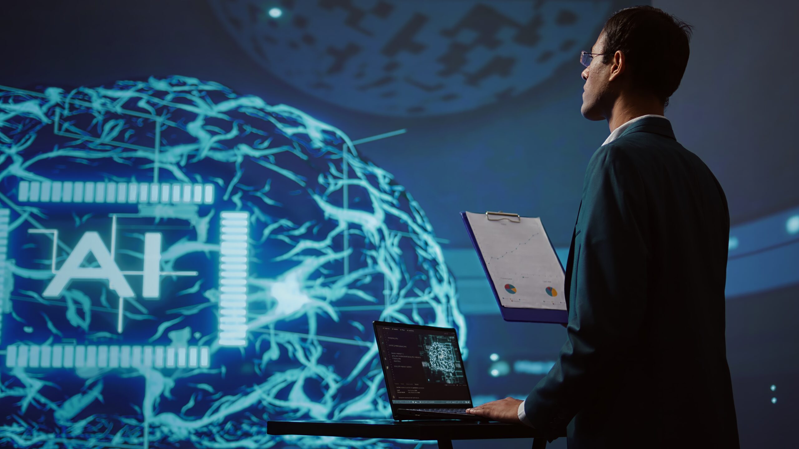 Startup Employee Looking Business Charts Using Ai Software 1 Scaled